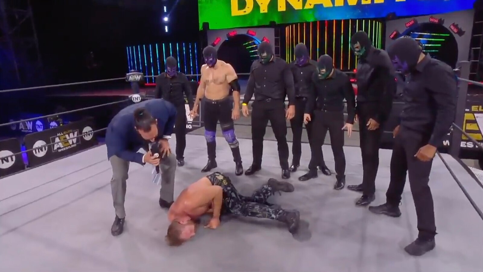 The Dark Order surrounding Moxley